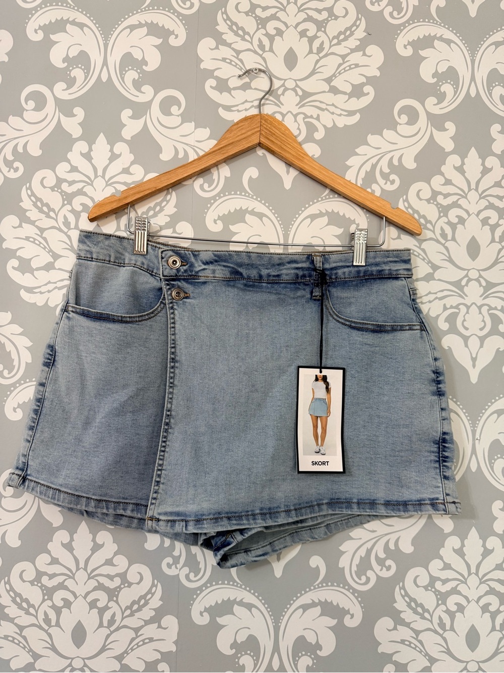 • BCBGeneration Light Wash Denim Asymmetric Wrap Skort